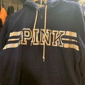 A women’s Victoria Secret Pink hoodie.